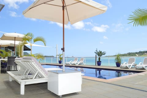 Outdoor pool, pool umbrellas, sun loungers