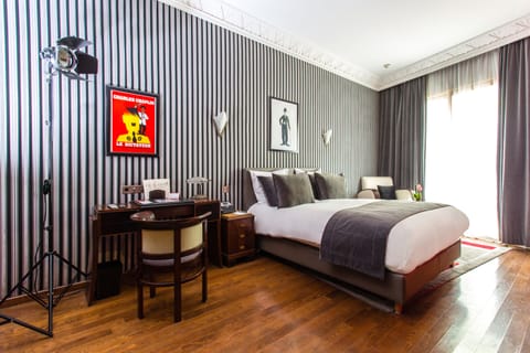 Executive Room | Premium bedding, minibar, in-room safe, individually decorated