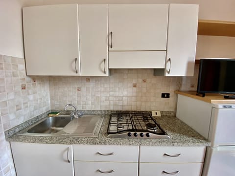 Apartment, 1 Bedroom (Malea) | Private kitchenette | Full-size fridge, stovetop, coffee/tea maker, cookware/dishes/utensils