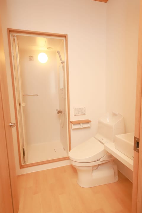 Basic Quadruple Room, Multiple Beds, Non Smoking, Refrigerator | Bathroom | Slippers, bidet, towels