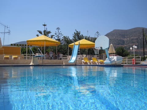 Outdoor pool, open 8:30 AM to 7:30 PM, pool umbrellas, sun loungers