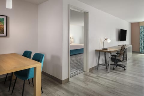 Suite, 1 King Bed with Sofa bed, Accessible (Mobility & Hearing, 3X3 Shower) | Desk, laptop workspace, blackout drapes, iron/ironing board