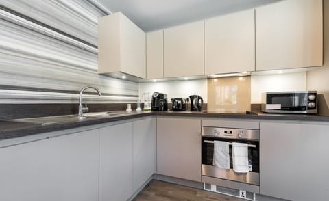 Apartment | Private kitchen | Full-size fridge, microwave, oven, stovetop