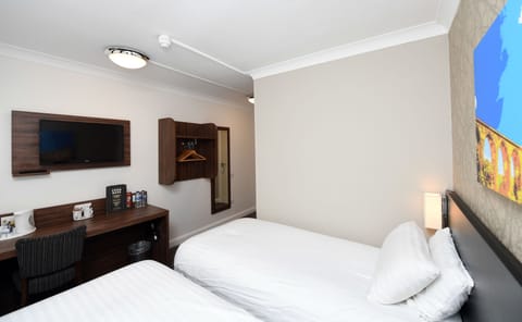 Double or Twin Room | Desk, iron/ironing board, free cribs/infant beds, free WiFi