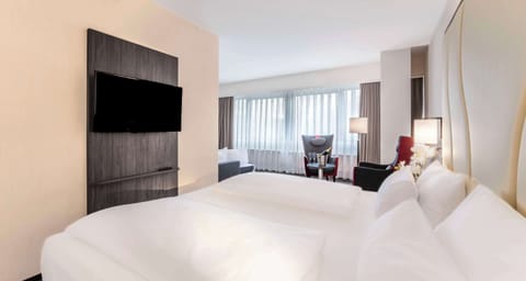 Junior Suite, Multiple Beds (Living Room;with Sofabed) | Laptop workspace, soundproofing, free cribs/infant beds, free WiFi