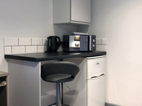 Fridge, microwave, coffee/tea maker, electric kettle