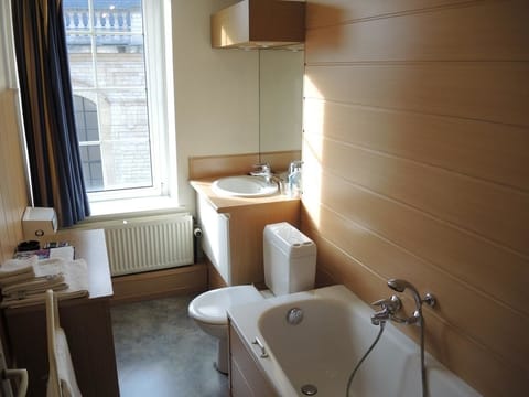 Basic Twin Room | Bathroom | Rainfall showerhead, hair dryer, towels, soap