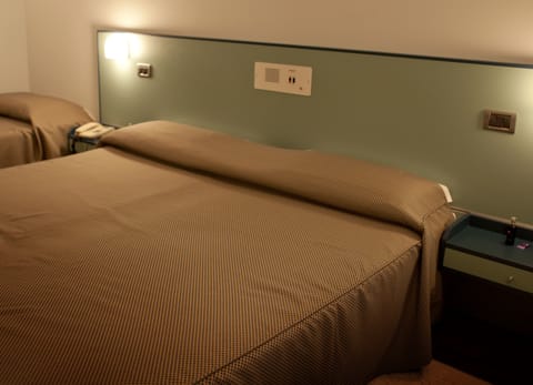 Premium bedding, down comforters, Select Comfort beds, minibar