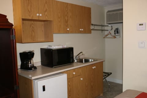 Standard Room, 2 Queen Beds | Private kitchenette | Fridge, microwave, coffee/tea maker, electric kettle