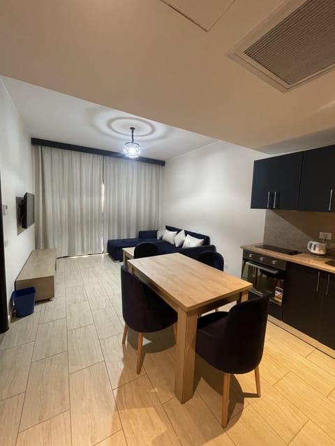 One Bedroom Apartments 3314 | Living area | 40-inch LED TV with satellite channels, TV