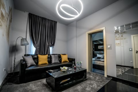 Apartment Old Town | Living room | Flat-screen TV