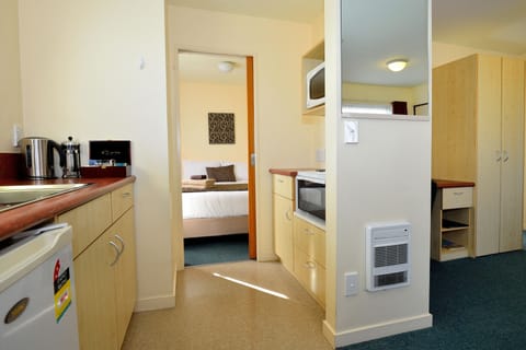 One Bedroom Unit | Private kitchenette | Mini-fridge, microwave, coffee/tea maker, electric kettle