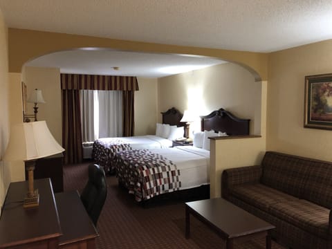 Suite, Multiple Beds, Non Smoking | Desk, laptop workspace, blackout drapes, iron/ironing board