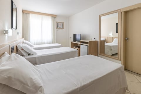 Standard Triple Room | Minibar, in-room safe, blackout drapes, free WiFi