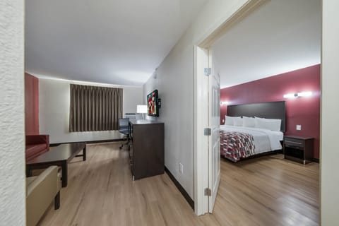 Suite, 1 King Bed, Non Smoking | Desk, iron/ironing board, free WiFi, bed sheets