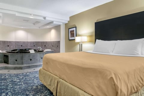 Suite, 1 King Bed, Non Smoking, Jetted Tub | Premium bedding, desk, blackout drapes, soundproofing