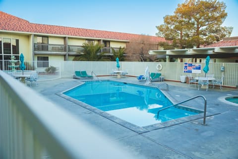 Outdoor pool, open 9:00 AM to 9:00 PM, sun loungers