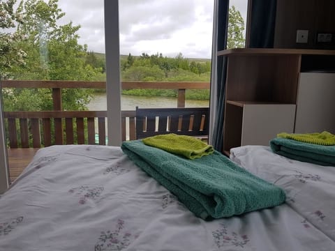 Double Room, Private Bathroom, Lake View | Desk, blackout drapes, soundproofing, bed sheets