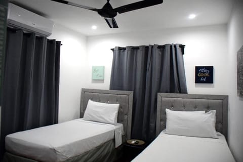 Premium bedding, blackout drapes, soundproofing, free WiFi