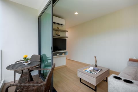 One Bedroom Suite Mountain View | Living area | Flat-screen TV