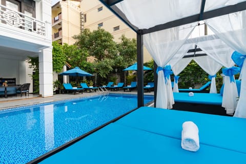 Outdoor pool, open 6:30 AM to 9:00 PM, pool umbrellas, sun loungers