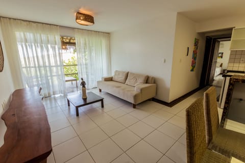 Quadruple Room, 2 Queen Beds, Balcony | Living room | 40-inch flat-screen TV with cable channels, TV