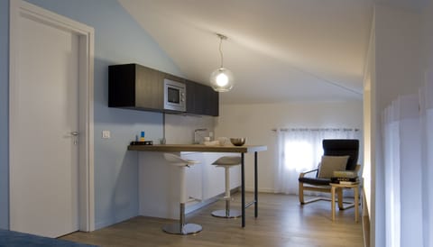 Fridge, stovetop, electric kettle, toaster