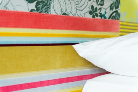 Premium bedding, down comforters, minibar, in-room safe