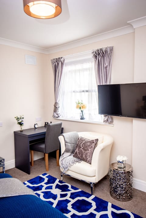 Individually furnished, desk, laptop workspace, blackout drapes