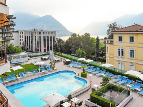 Seasonal outdoor pool, pool umbrellas, sun loungers