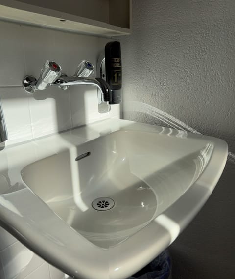 Shower, free toiletries, hair dryer