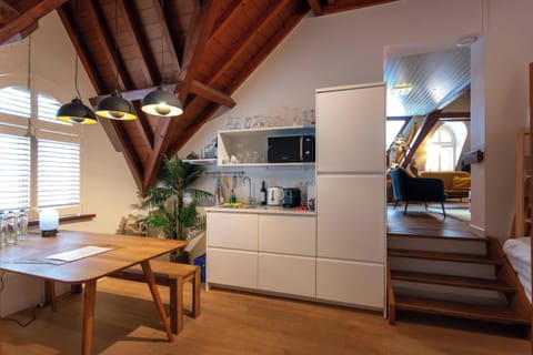 Deluxe Spanish Penthouse Suite | Private kitchenette | Fridge, microwave, coffee/tea maker, electric kettle