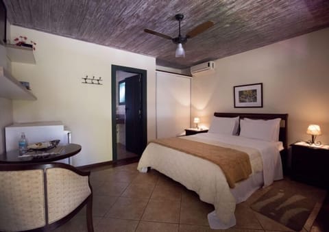 Standard Double Room | Minibar, desk, blackout drapes, iron/ironing board