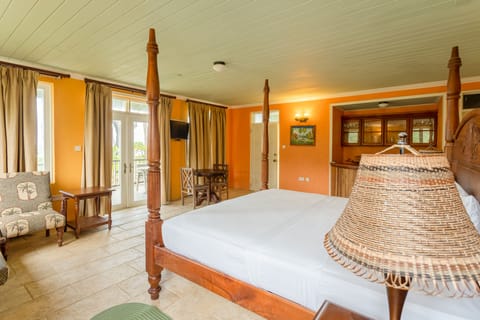 Honeymoon Suite, 1 King Bed, Ocean View | Down comforters, in-room safe, individually furnished, desk