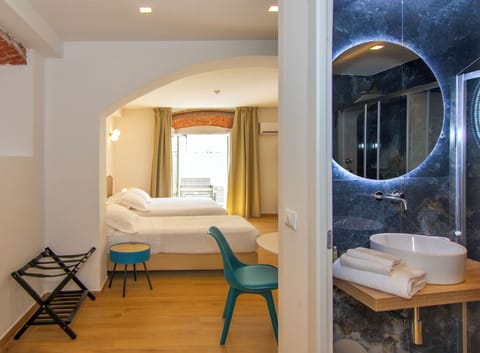 Junior Room, Multiple Beds, Private Bathroom | 1 bedroom, minibar, in-room safe, individually decorated