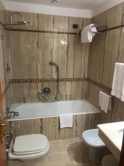 Shower, free toiletries, hair dryer, bidet