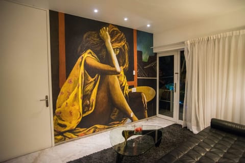 Junior suite with private terrace | Living room | 52-inch Smart TV with cable channels, first-run movies