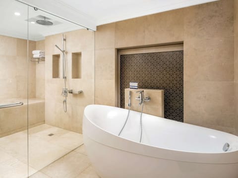 Combined shower/tub, eco-friendly toiletries, hair dryer, slippers