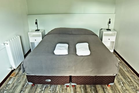 Deluxe Apartment | Pillowtop beds, in-room safe, laptop workspace, blackout drapes