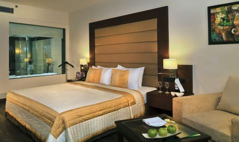 Premium bedding, free minibar items, in-room safe