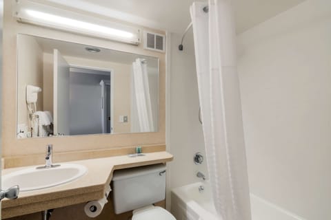 Standard Room, 2 Queen Beds, Non Smoking | Bathroom | Combined shower/tub, free toiletries, hair dryer, towels