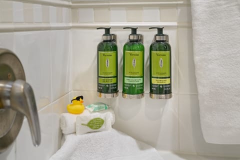 Combined shower/tub, designer toiletries, hair dryer, bathrobes