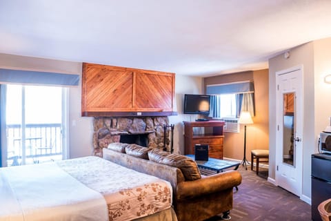 King on the River with Fireplace (Not Pet Friendly) | Pillowtop beds, in-room safe, desk, laptop workspace