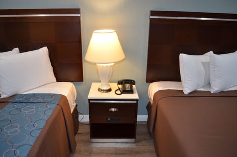 Standard Room, 2 Queen Beds, Non Smoking | Minibar, in-room safe, desk, iron/ironing board