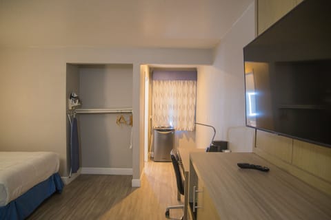 Room, 2 Queen Beds, Accessible, Non Smoking (Mobility/Roll-In Shower) | In-room safe, iron/ironing board, free cribs/infant beds