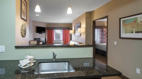 Suite, 1 Bedroom | Private kitchen | Microwave, stovetop, dishwasher, coffee/tea maker