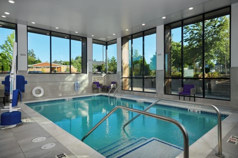 Indoor pool, open 7:00 AM to 11:00 PM, sun loungers