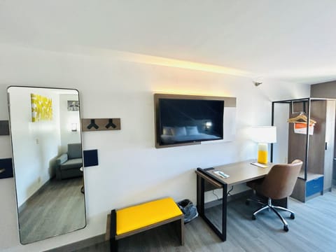 49-inch flat-screen TV with cable channels, TV