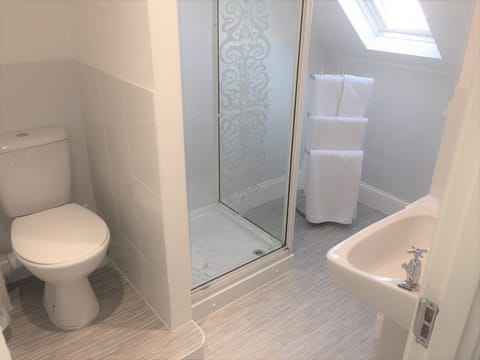 Shower, towels, soap, shampoo