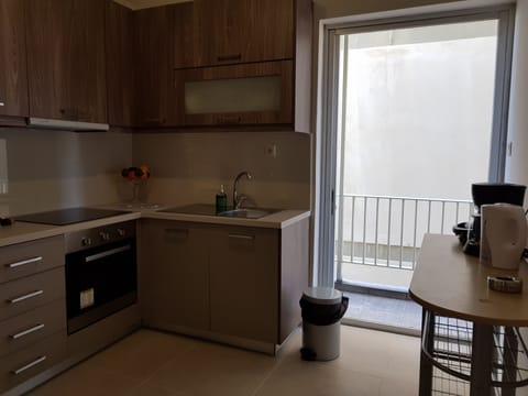 Apartment, 2 Bedrooms | Private kitchenette | Full-size fridge, oven, stovetop, coffee/tea maker